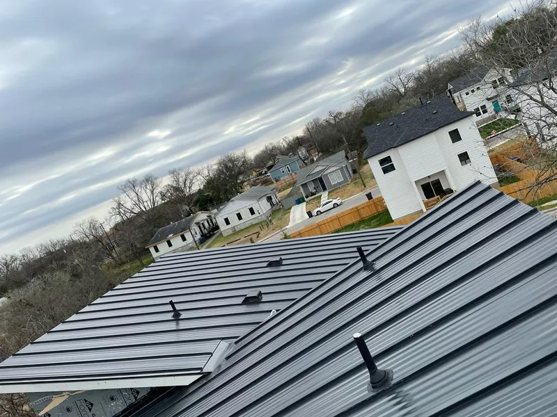 Standing seam metal roof panels with vents for Skylight Repair in West Windsor